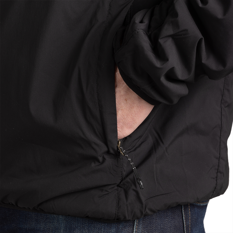 Lightweight tactical jacket with zippered pockets